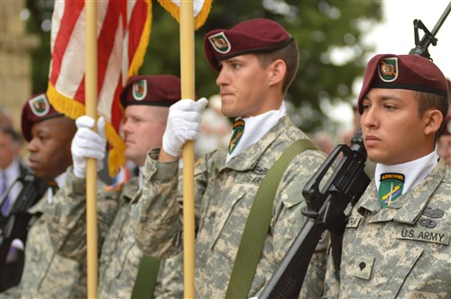 GRAINGES, France – Dutch, German and U.S. paratroopers joined a ceremony held French townspeople in Graignes, south of Carentan, where U.S. 82nd Airborne Division fought during the early morning hours of June 6, 1944. The paratroopers had been dropped off course. About 100 paratroopers held off 2,000 Germans for 2 days. Some escaped with a few townspeople.  Others were burned in the town church. A month later, on July 9, U.S. Soldiers liberated the town. The ceremony was held on the church grounds. 