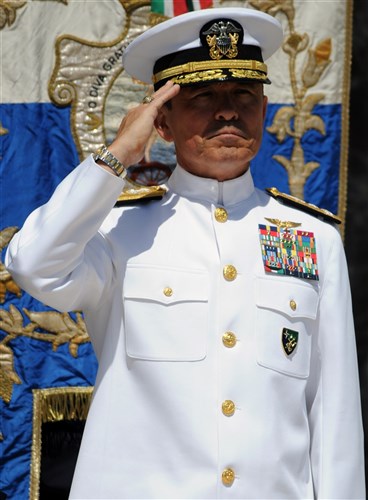 NETTUNO, Italy (May 30, 2011) - Vice Adm. Harry B. Harris Jr., commander of U.S. 6th Fleet, salutes during the presentation of the American and Italian national anthems. Harris travelled to the Sicily-Rome American Cemetery and Memorial to participate in a Memorial Day ceremony as the guest speaker. The cemetery is the final resting place of 7,861 service members and the Wall of the Missing memorial notates the names of 3,095 service members. 