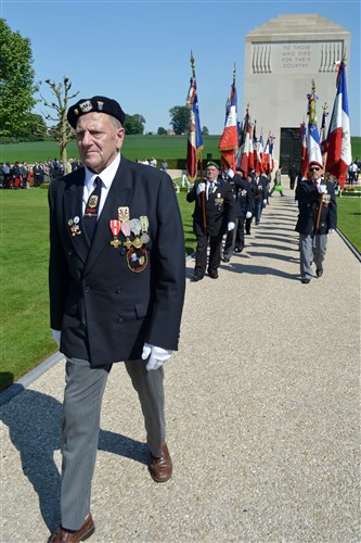 French veterans carried their organizational colors during the ceremonies. American Soldiers served in the Somme sector of the frontlines in France during World War I, alongside British, Canadian, Australian, Belgian and French forces. The Somme American Military Cemetery, near Bony, France, is the final resting place for more than 1,800 U.S. Soldiers. On May 27, 2012, troops from U.S. European Command, to include keynote speak Rear Admiral John Messerschmidt, U.S. Army Soldiers from the 5th Signal Theater Strategic Command and the Shape International Band, took part in a Memorial Day ceremony. 