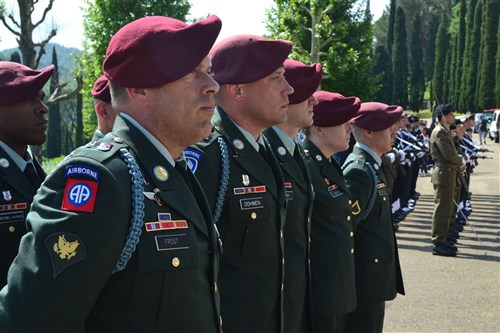 Soldiers from the 173rd Airborne Brigade Combat Team based in Vicenza, Italy, stand in formation next to Italian troops during the Memorial Day ceremony at the Florence American Cemetery May 28, 2012. 