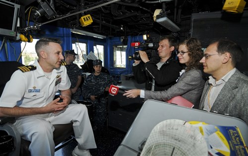 ST. PETERSBURG, Russia (June 28, 2011)  Cmdr. Patrick E. Kulakowski, commanding officer of the guided-missile frigate USS Carr (FFG 52), speaks with Russian media during a press conference and tour of the ship shortly after they arrived in St. Petersburg. Carr is homeported out of Norfolk, Va., and is on a scheduled three-month deployment supporting maritime security operations and theater security cooperation efforts in the U.S. 6th Fleet area of responsibility. 