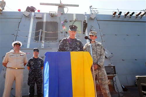 ODESSA, Ukraine - Cmdr. David Bretz, commanding officer of guided-missile destroyer USS Jason Dunham (DDG 109), speaks to Ukrainian media aboard the ship during Exercise Sea Breeze 2012 (SB12). SB12, co-hosted by the Ukrainian and U.S. navies, aims to improve maritime safety, security and stability engagements in the Black Sea by enhancing the capabilities of Partnership for Peace and Black Sea regional maritime security forces. 