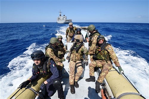 160525-N-XT273-411 MEDITERRANEAN SEA (May 25, 2016) Italian sailors and marines participate in a mock visit, board, search, and seizure boarding drill aboard the Royal Moroccan ship P611 during exercise Phoenix Express 2016, May 25. Phoenix Express is a U.S. Africa Command-sponsored multinational maritime exercise designed to increase maritime safety and security in the Mediterranean. (U.S. Navy photo by Mass Communication Specialist 2nd Class Justin Stumberg/Released)