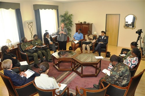 GARMISCH, Germany - Pamela Bellamy, U.S. Africa Command J-9 (Strategic Communication), interprets while African enlisted women introduce themselves during the Africa Enlisted Working Groups as part of the 2012 Joint Warrant Officer and Senior Noncommissioned Officer Symposium held in Garmisch, Germny, May 21-25. During the session, nine enlisted women from Africa shared their stories, gender-related issues and experiences with Major General Barbara Faulkenberry, U.S. Africa Command logistics director. (U.S. AFRICOM photo by Staff Sergeant Femi Owolabi)