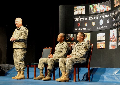 STUTTGART, Germany - General Carter Ham, Commander, U.S. Africa Command, calls Command Sergeant Major Mark Ripka, U.S. AFRICOM senior enlisted leader, "an exceptional and extraordinary soldier, a leader and simply put, just a good man," during a change-of-responsibility ceremony at the Kelley Theatre March 11, 2011, where Ripka relinquished his responsibilities to Chief Master Sergeant Jack Johnson Jr. (U.S. AFRICOM photo by Staff Sergeant Amanda McCarty)