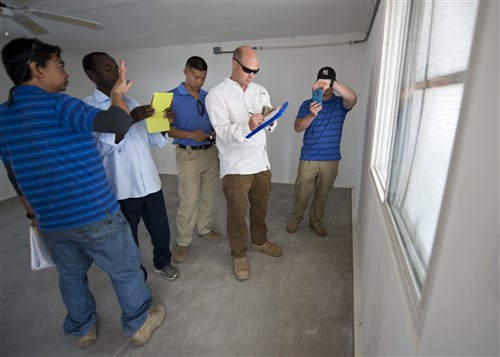 Combined Joint Task Force-Horn of Africa team engineers conduct the final inspections on the Kalaf clinic in Kalaf, Djibouti, Dec. 22, 2014. The clinic will provide 3,000 people in the area with healthcare and a better access to vaccinations against contagious diseases. (U.S. Air Force photo by Staff Sgt. Kevin Iinuma)