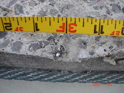 gouge in concrete wall