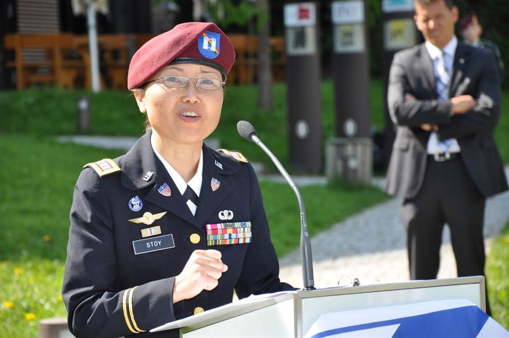 OBERSALZBERG, Germany -- Retired Capt. Monika Stoy, president of the European chapter of the Society of the 3rd Infantry Division, talks about the courage of U.S. Army soldiers who raised the flag here May 5, 1944. Stoy, who helped organize the ceremony, spoke during the commemoration of the 66th anniversary of the flag raising event attended by about 150 people. (Department of Defense photo/Jason Tudor)