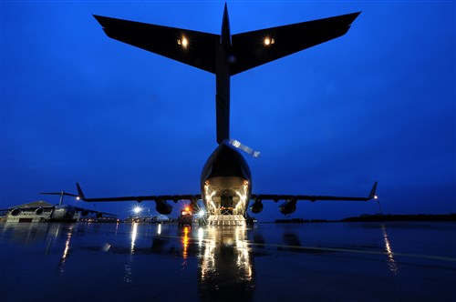 Early this year, U.S. Airmen prepare a C-17 Globemaster III aircraft to fly French soldiers and their cargo to Africa.  Two U.S. Air Force C-17 Globemaster III aircraft and a small command and support team are on the ground in Uganda, preparing to conduct airlift operations in support of ongoing peacekeeping operations in the Central African Republic. (Photo by Senior Airman James Richardson/Released)  