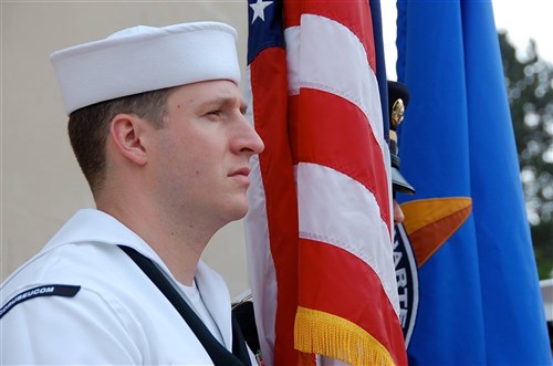 A U.S. European Command joint color guard participates in the D-Day commemoration ceremony at the National Guard Monument on Omaha Beach in Vierville-sur-mer, France, June 6, 2013.