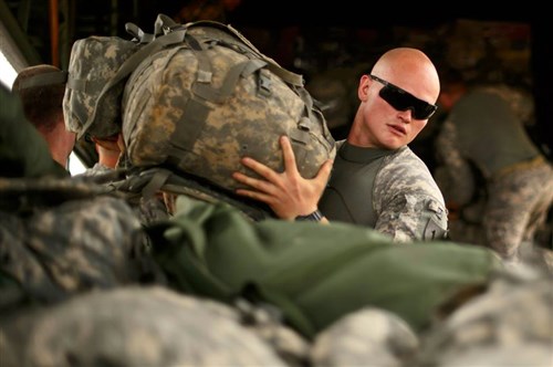 U.S. Army soldiers with Combined Joint Task Force-Horn of Africa's East Africa Response Force (EARF), unload gear and supplies from a U.S. Air Force C-130J Hercules in Juba, South Sudan, Jan. 22, 2014. The EARF has been positioned at the U.S. Embassy in Juba, South Sudan since Dec. 18, 2013, when the initial evacuation of U.S. citizens took place. The EARF is part of a Defense Department initiative of regionally aligned forces, which provides the commander of the U.S. Africa Command an additional capability to respond to crises and contingencies within East Africa. (U.S. Air Force photo by Staff Sgt. Staci Miller)