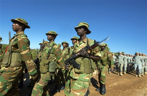 Members of the Zambian Defense Force march with U.S. Army soldiers during the opening day ceremony for Exercise Southern Accord in Lusaka, Zambia on Aug. 4. The annual exercise provides U.S. military, United Nation allies and the Zambian Defense Force an opportunity to work and train together as a combined joint peacekeeping allied force. (U.S. Army Africa photo by Staff Sgt. Brian Kimball)