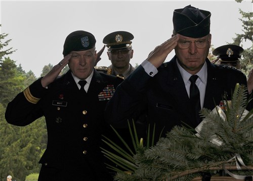 Air Force Gen. Craig McKinley, right, the chief of the National Guard Bureau, and Army Maj. Gen. Gregory Wayt, left, the adjutant general of the Ohio National Guard, lay a wreath at the Monument to the Unknown Hero on Mount Avala in Serbia on Sept. 11, 2010.  â?It was especially poignant today, on the anniversary of Sept. 11, 2001, when our nation was attacked, that I symbolically thank the Serbian military for their support to the United States in World War I and World War II,,â? McKinley said. Serbia and Ohio are paired in the National Guard State Partnership Program. (U.S. Army photo by Staff Sgt. Jim Greenhill) 