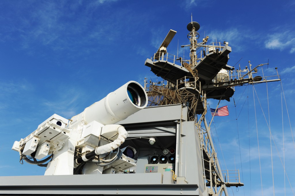 The Afloat Forward Staging Base (Interim) USS Ponce (ASB(I) 15) conducts an operational demonstration of the Office of Naval Research (ONR)-sponsored Laser Weapon System (LaWS) while deployed to the Arabian Gulf. (U.S. Navy photo by John F. Williams/Released)