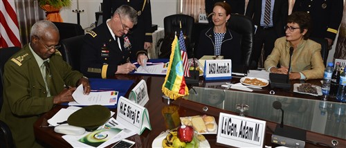 Gen. David Rodriguez, Commander U.S. Africa Command and en. Samora Yunis, Chief of Staff Ethiopian National Defense Force sign the summary of conclusions after a Bilateral Defense Committee (BDC) meeting in Addis Ababa, Ethiopia, March 31, 2016. The new agreement out lines the cross-exchange of logistics, services, supplies and support, as well as a way forward for the Africa Data-Sharing Network and combat engineering. (U.S. Air Force photo by Tech. Sgt. Dan DeCook/Released)