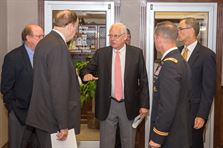 Mobile District - Legislative Liaison E. Patrick Robbins, US Senator Richard Shelby, Alabama State Port Authority - Director James Lyon, Mobile District Commander - Col. James DeLapp, and Mobile District - Deputy Engineer for Programs and Project Management Peter Taylor talks before entering the Mobile Harbor GRR In Progress Meeting. 