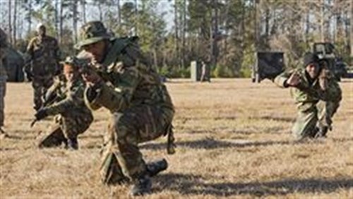 African role players rehearse combat drills aboard Marine Corps Base Camp Lejeune, N.C., Dec. 11, 2014. More than 80 Marines with Marine Wing Support Squadron 272 and 2nd Battalion, 8th Marine Regiment taught military tactics and built camaraderie with role players in preparation for an upcoming deployment with Special-Purpose Marine Air-Ground Task Force Crisis Response-Africa. (Photo by Lance Cpl. Lucas Hopkins)