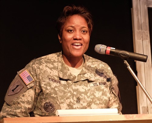 U.S. Army Garrison Command Sgt. Major Lynice Thorpe delivers remarks. “A Century of Black Life, History and Culture” served as the theme for this year’s Black History Month celebration, held at Kelley Barracks, U.S. Army Garrison Stuttgart, Feb. 26, 2015.  Performances by the Patch High School and Stuttgart Gospel Service Choirs and a dance from the play “Her Stories” highlighted the accomplishments of African Americans over the past century. (U.S. Africa Command photos by Brenda Law/Released)  