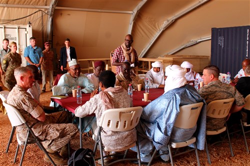 Gen. Thomas Waldhauser, Commander, U.S. Africa Command, and U.S. Ambassador to Niger Eunice Reddick meet with several Nigerien civilian leaders outside of Agadez, Niger on Nov. 1, 2016 to discuss improvements to Niger's Air Base 201. (Photo by Samantha Reho, U.S. Africa Command Public Affairs/Released)