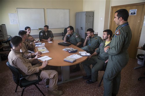 U.S. Marines with Special-Purpose Marine Air-Ground Task Force Crisis Response-Africa coordinate an aerial refueling mission with pilots from the Spanish Air Force, Aug. 13, at Morón Air Base, Spain. Five Spanish Eurofighter Typhoons and a KC-130J Hercules from SPMAGTF-CR-AF successfully conducted a refueling of the Spanish aircraft for the first time highlighting a mutual commitment to working together as allies. (U.S. Marine Corps photo by Staff Sgt. Vitaliy Rusavskiy/Released)