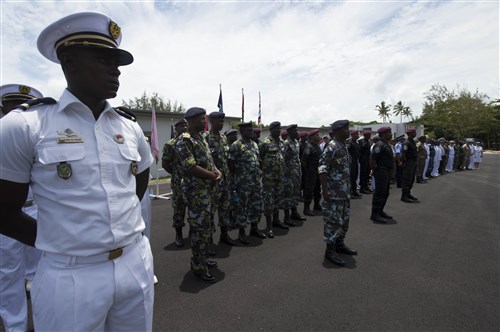 150204-N-QY759-110 LE CHALAND, Mauritius (Feb. 4, 2015) Boarding team members from East African and Indian Ocean militaries gather for a group photo after the Exercise Cutlass Express 2015 closing ceremony. Exercise Cutlass Express 2015, sponsored by U.S. Africa Command, is designed to improve regional cooperation, maritime domain awareness, and information sharing practices to increase capabilities of East African and Indian Ocean nations to counter sea-based illicit activity. (U.S. Navy photo by Mass Communication Specialist 1st Class David R. Krigbaum/Released)