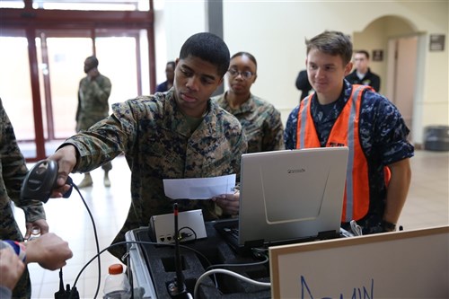 Nearly 100 Marines and sailors with Special-Purpose Marine Air-Ground Task Force Crisis Response-Africa established an evacuation control center for an exercise in Naval Air Station Sigonella, Italy. The exercise prepared the crisis response unit for a military assisted departure mission. The passenger terminal used hosted a real ECC 19 months ago when SPMAGTF-CR-AF, assisted in the evacuation of U.S. personnel from the U.S. embassy in Tripoli, Libya. U.S. citizens and embassy personnel traveled by ground convoy to neighboring Tunisia, before being flown to NAS Sigonella, where they were processed through the ECC before moving on to other locations.