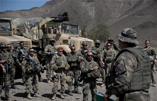 French and U.S. Army Soldiers listen to the plan of action during a field training exercise March 17, 2016, in Arta, Djibouti. The bilateral training exercise was one of many engagements U.S. and French forces have held throughout the year that maximizes the benefits of serving at the same location, and enables the allies to learn and experience each other’s tactics, techniques and procedures.  