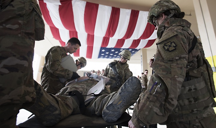 A medical response team triages a patient in “Warrior’s Way” at the Craig Joint Theater Hospital, Bagram Airfield, Afghanistan, during a mass casualty exercise. More than a dozen patients were treated at the hospital after a simulated improvised explosive device attack. (U.S. Air Force photo by Staff Sgt. Katherine Spessa)