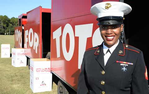 Cpl. Jasmine Alvarado, administrative clerk, Detachment 2, Combat Logistics Battalion-453, participates in the annual Toys for Tots campaign aboard Marine Corps Logistics Base Albany, Sept. 30.  