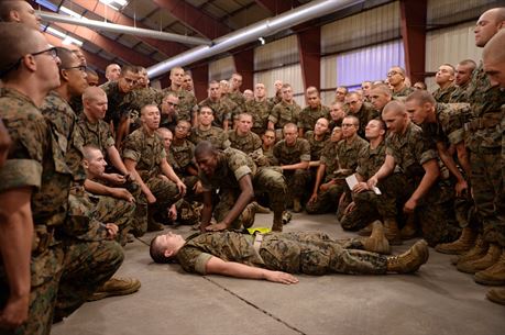 Recruits from Marine Corps Recruit Depot Parris Island, S.C., practice combat care while aboard Marine Corps Logistics Base Albany, Oct. 11.