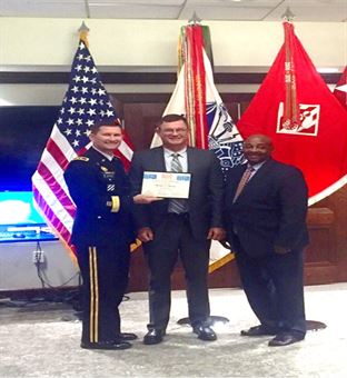 U.S. Army Corps Engineers Deputy Commanding Major General Donald E. (Ed) Jackson and Senior Executive Service member Theodore A. (Tab) Brown awards Michael Malsom with USACE Planning Associates Program certificate of completion in Washington on Aug. 30.   