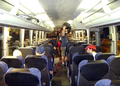 Photo of young travelers aboard a motorcoach