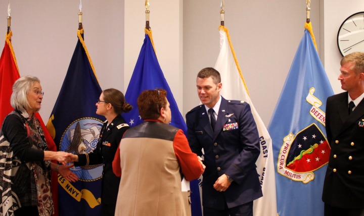 Dr. Karen Guice (far left), acting assistant secretary of Defense for Health Affairs, and Dr. Nancy Dickey (center), president of Defense Health Board, congratulate DHB scholars during the board’s 10th anniversary celebration Nov. 1. 