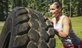 U.S. Marine Cpl. Logan Block flips a tire during a physical training session at Marine Corps Recruiting Command at Quantico, Virginia. The best time of day to exercise is the time when you can maintain a consistent exercise routine – not necessarily the same time for everyone. (U.S. Marine Corps photo)