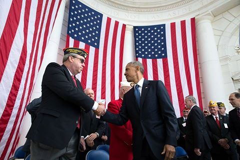 '@[424207551102424:274:President Obama] shakes the hand of Donald E. Larson, National President of the Fleet Reserve Association, after delivering remarks during a Veterans Day ceremony at the Memorial Amphitheater at Arlington National Cemetery in Arlington, Virginia, Nov. 11, 2016. (Official White House Photo by Pete Souza)'
