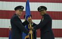 Gen. Tod D. Wolters, U.S. Air Forces in Europe and Air Forces Africa commander, passes the guidon to Lt. Gen. Richard M. Clark, 3rd Air Force commander, during a change of command ceremony at Ramstein Air Base, Germany, Oct. 21, 2016. The passing of the guidon symbolizes the transfer of command. (U.S. Air Force photo by Senior Airman Tryphena Mayhugh)