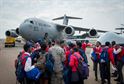 South African students tour U.S. military aircraft at the African Aerospace and Defense Expo at Waterkloof Air Force Base, South Africa, Sept. 14, 2016. The U.S. military is exhibiting a C-17 Globemaster III, a KC-135 Stratotanker, a C-130J Super Hercules, an HC-130 King, and an MQ-9 Reaper. The aircraft come from various Air National Guard and Air Force Reserve Command units. The U.S. routinely participates in events like AADE to strengthen partnerships with regional partners. (U.S. Air Force photo by Tech. Sgt. Ryan Crane)