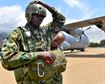 A Ghanaian army paratrooper’s gear is inspected prior to boarding a C-130J Super Hercules during African Partnership Flight in Accra Air Base, Ghana, Sept. 13, 2016. For some of the paratroopers  it&#39;s their first time jumping in the past two years, this jump will help them maintain certification and remain current on personnel drops while familiarizing themselves with the C-130 procedures. (U.S. Air Force photo by Staff Sgt. Stephanie Longoria)