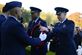 U.S. Air Force Col. Evan Pettus, 48th Fighter Wing commander, receives a wreath at the Cambridge American Cemetery in Cambridge, England, Nov. 11. Distinguished visitors and veterans were invited to participate in the ceremony by placing wreathes along the Tablets of the Missing. (U.S. Air Force photo/Senior Airman Malcolm Mayfield) 
