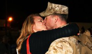 Photo: A Marine deployed with Combat Logistics Regiment 15, 1st Marine Logistics Group, kisses his wife during a homecoming aboard Camp Pendleton, Calif., Thursday, Feb. 7, 2013. Marines and sailors with CLR-15 were deployed to Helmand province, Afghanistan, in support of Regional Command Southwest. U.S. Marine Corps photo by Cpl. Laura Gauna