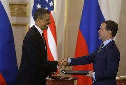 Date: 04/08/2010 Description: U.S. President Barack Obama, left, shakes hands with his Russian counterpart Dmitry Medvedev, right, after signing the newly completed New START treaty reducing long-range nuclear weapons at the Prague Castle in Prague, Czech Republic, Thursday, April 8, 2010. © AP Image