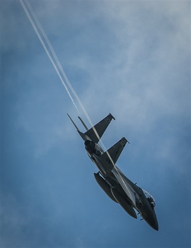 An F-15C Eagle peels off from the formation as it prepares to land at Leeuwarden Air Base, Netherlands, March 31, 2015. F-15C Eagles from the Florida Air National Guard's 159th Expeditionary Fighter Squadron are deployed to Europe as the first ever ANG theater security package here. These F-15s will conduct training alongside our NATO allies to strengthen interoperability and to demonstrate U.S. commitment to the security and stability of Europe. (U.S. Air Force photo/Staff Sgt. Ryan Crane)