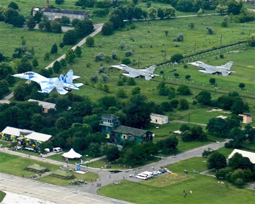 Air National Guard F-16Cs fly in formation with a Ukrainian SU-27 over Mirgorod Air Base, Ukraine during SAFE SKIES 2011 on July 22, 2011. (U.S. Air Force photo by Tech. Sgt. Charles Vaughn, 144 FW/PA)