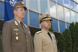 BUDAPEST, Hungary &mdash; Supreme Allied Commander Europe, Navy Adm. James Stavridis and Hungarian Chief of Defense Lt. Gen. Tibor Benko observe an honour guard welcome ceremony in Budapest on June 7. (Department of Defense photo)