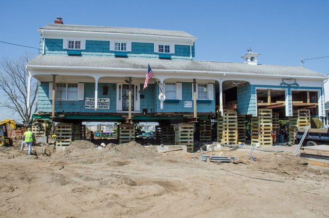Freeport, N.Y., May 20, 2013 --After the storm surge from Hurricane Sandy flooded their house with 5 feet of water, the homeowners made the decision to elevate their house above the new flood level of 12 feet determined by New York State and FEMA.