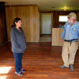 Image cover photo: Tribal Chief Tours Repaired Home with a Volunteer