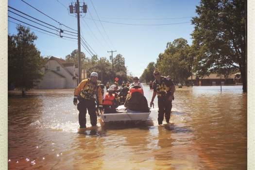 USAR teams evacuating survivors from a North Carolina neighborhood in the aftermath of Hurricane Matthew