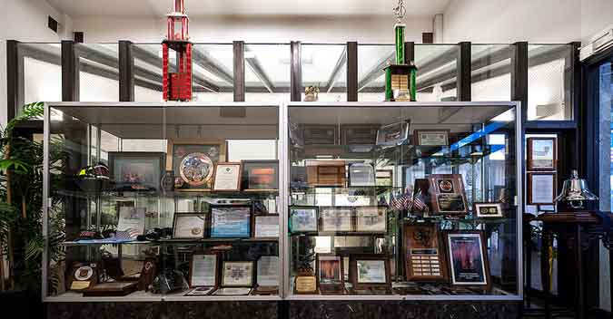 Multiple awards and trophies received by the Federal Fire Department Hawaii are displayed at its headquarters in Honolulu. (U.S. Navy photo by MC3 Diana Quinlan)