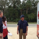 Image cover photo: FEMA Officials and Red Cross discuss situation
