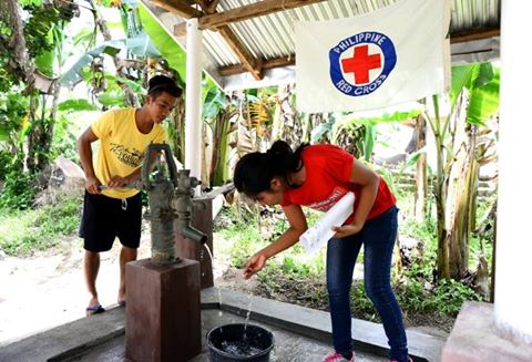 'Volunteers pump a newly-built water system for three hours to eliminate sand below and guarantee there is no water discoloration. Residents will use this pump for a variety of daily activities, including hydrating livestock and laundry. All hand pumps undergo this process to ensure water will not run dry even upon continuous pumping.

 Thyjiacinth Ylla Mavourneen De Ocampo/ @[220779007947516:274:Philippine Red Cross]'